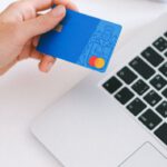 E-commerce Personalization - Person Holding Bank Card