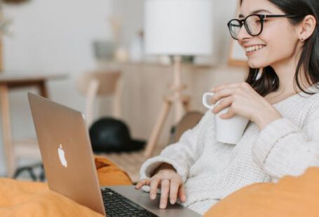 B2b E-commerce - Woman Having Coffee While Using Laptop